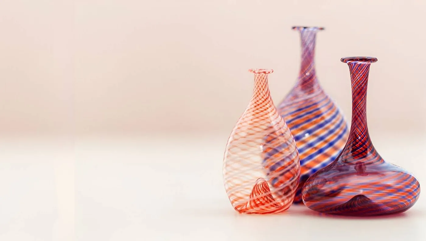 Venetian glass vessels on a shelf